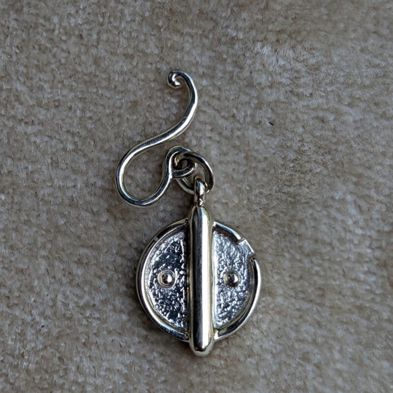 The Maya Charm - A reminder of the hidden